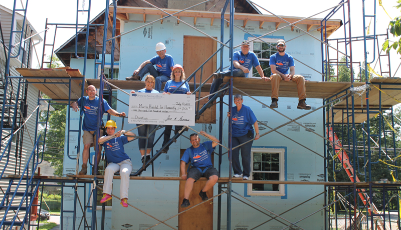 Spencer Savings Bank Donates Money and Volunteer Labor To Help Build Homes in Morris County
