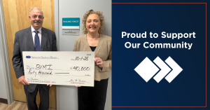 CEO handing over a check to CEO of BVMI