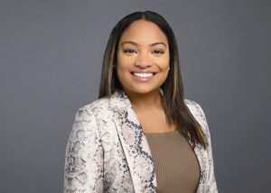 Portrait of Rasheeda Soto smiling, Nutley manager